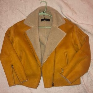 Cropped mustard yellow suede jacket.